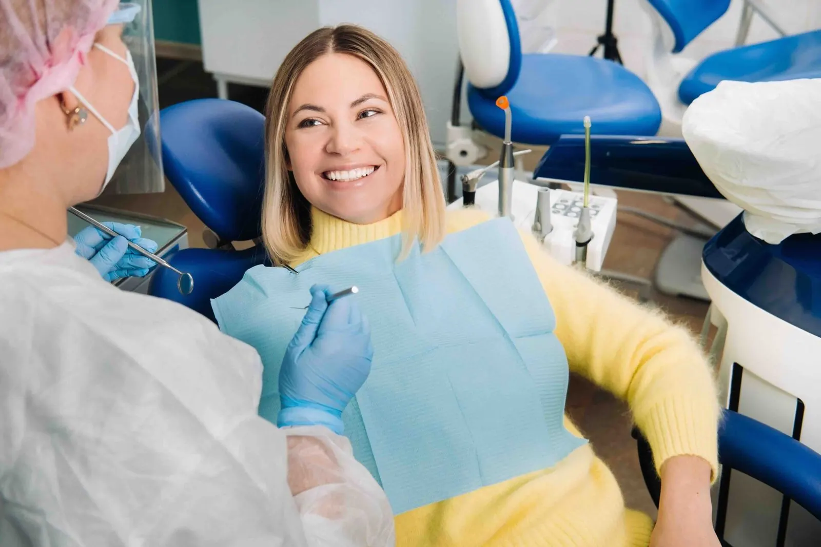 Dental patient smiling in chair