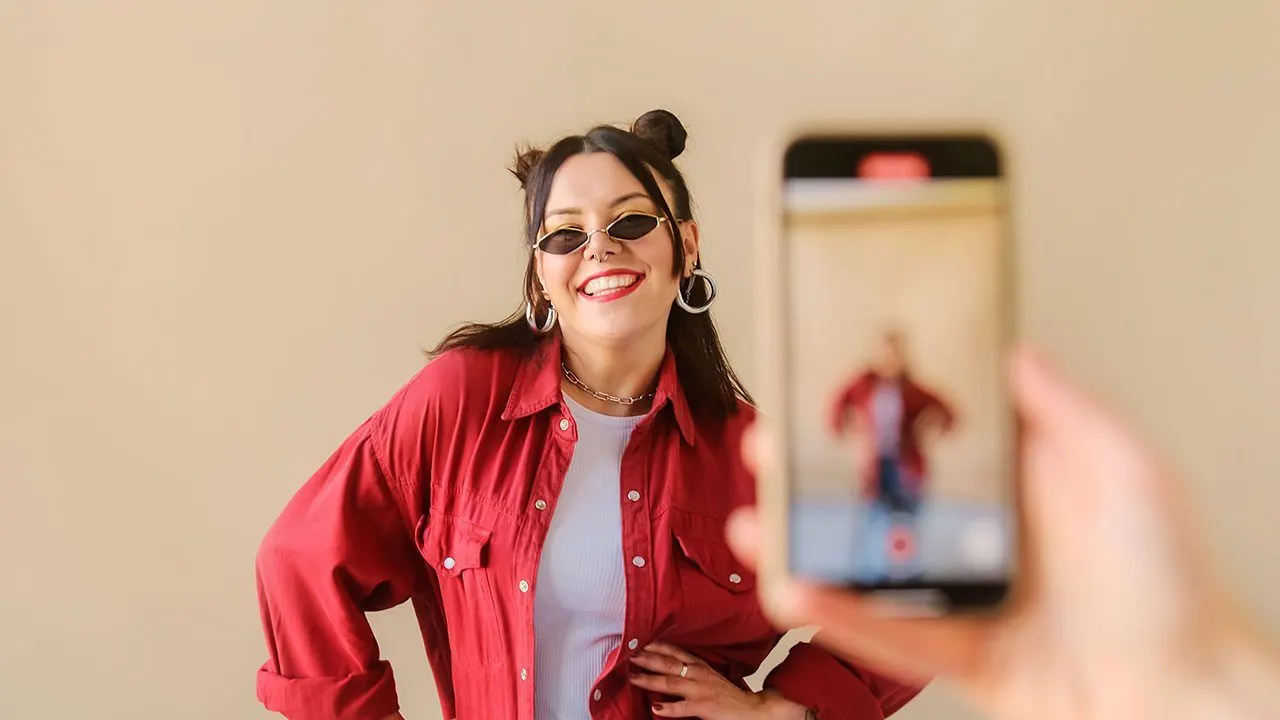 Influencer filming on phone