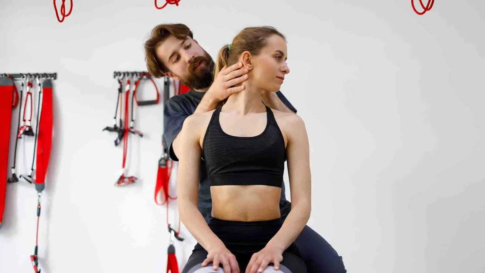 Chiropractor adjusting patient